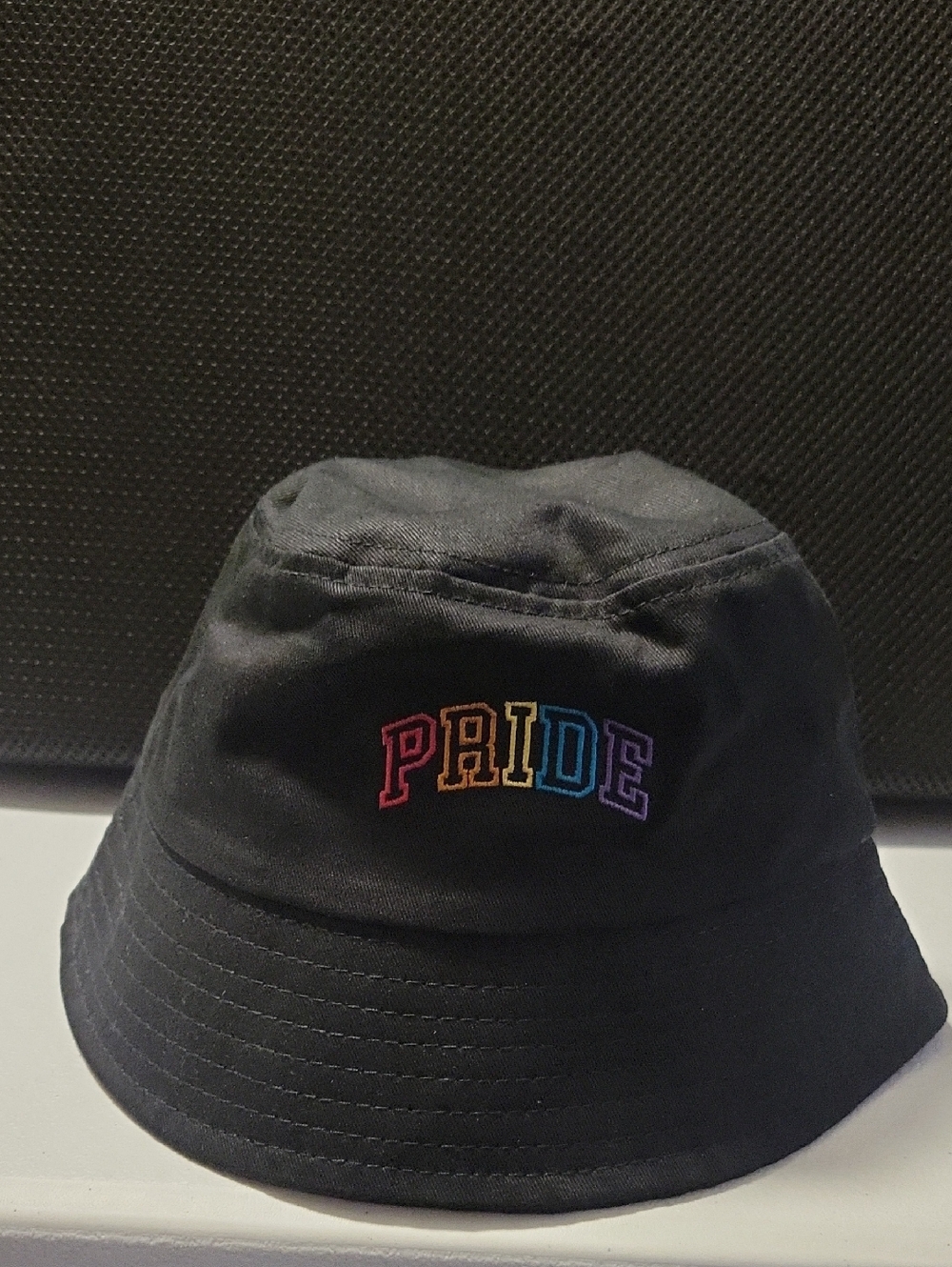Black Bucket Hat with Rainbow PRIDE Embroidery.  12